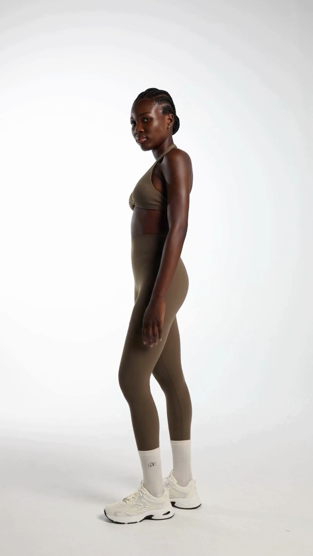 Origin Leggings in olive styled for Pilates and everyday movement with gentle sculpting support.