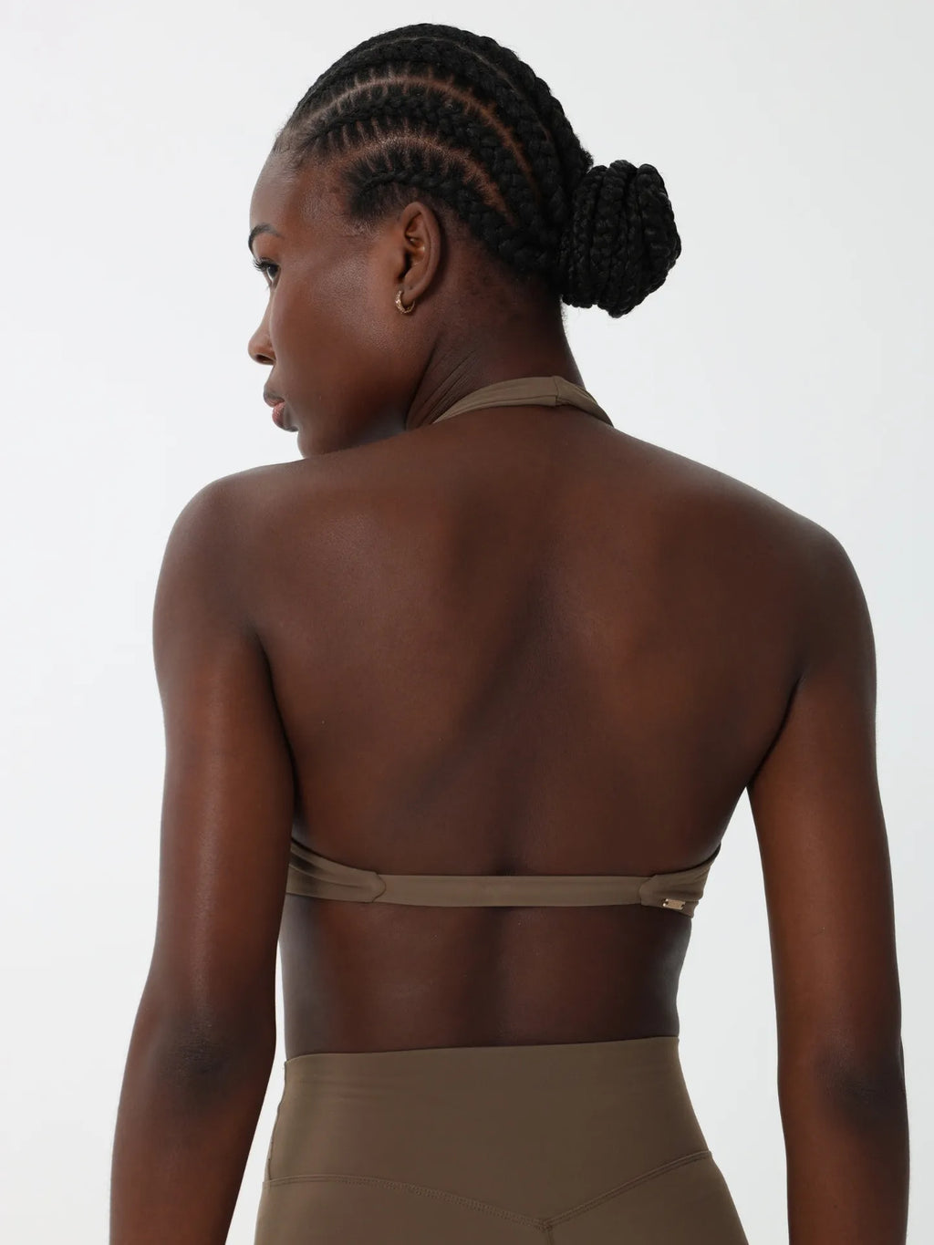 Origin Twist-Front Halter Bra in olive styled for Pilates and low-impact training