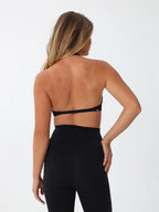 Back view of onyx halter sports bra allowing free shoulder movement